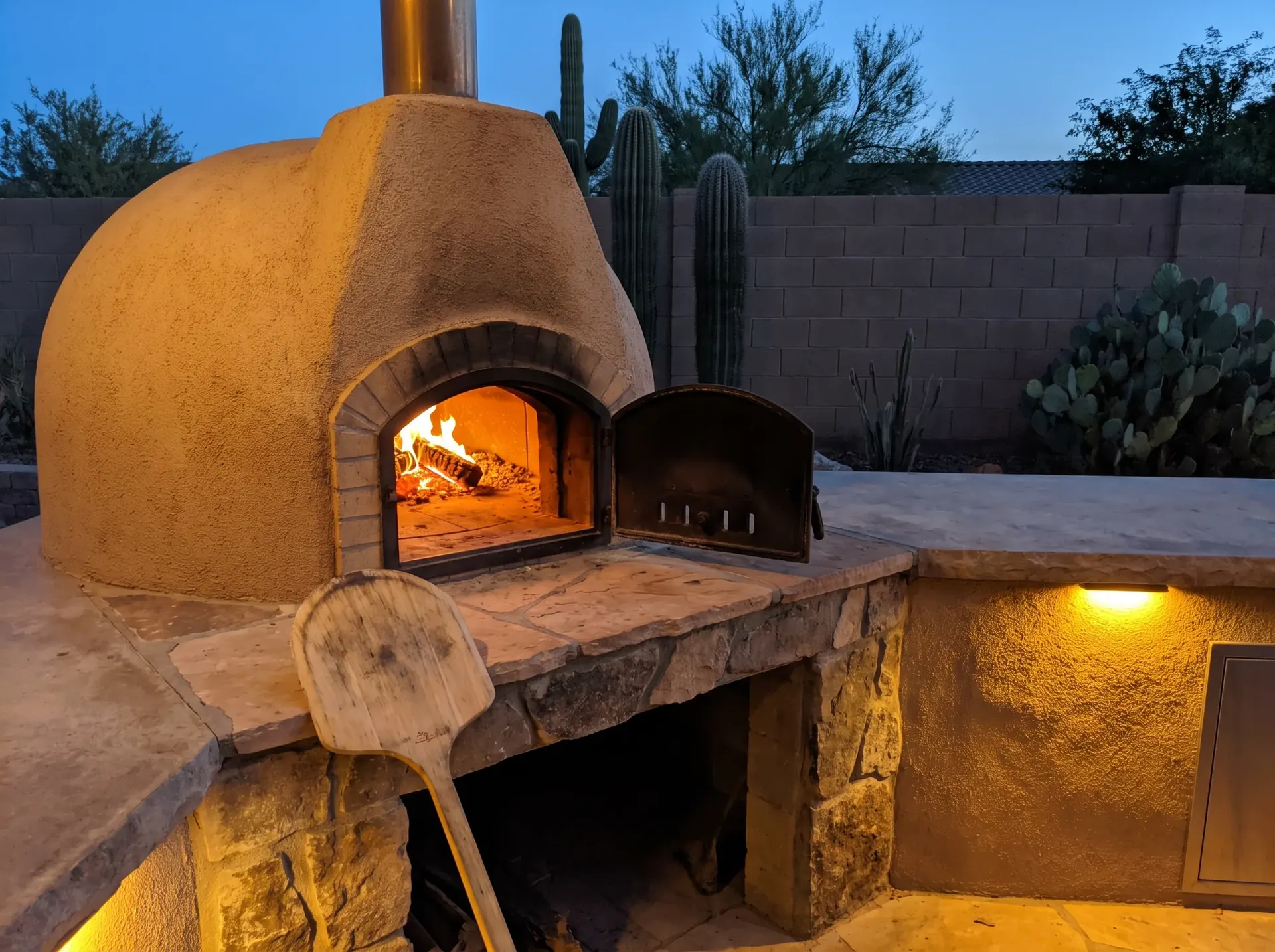 Built in domed pizza oven in an outdoor kitchen in Tucson